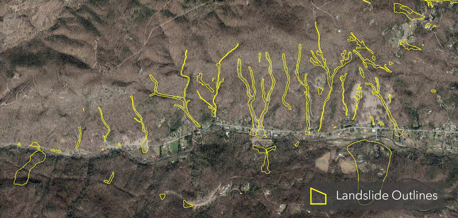 Static map showing landslide outline polygons in western North Carolina counties as colored outlined shapes over a topographic basemap, representing approximate areal extents of individual slope movements